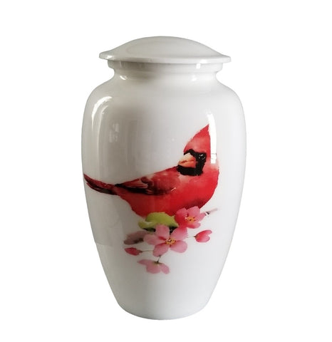 Cardinal Cremation Urn for Ashes with red cardinal on branch with pink flowers.
