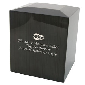 wooden urn for two with engraved wedding rings 